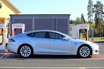 Image showing Silver Tesla Model S at Supercharger Charging Station 