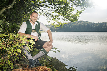 Image showing bavarian tradition man at the lake