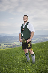 Image showing bavarian tradition man in the grass