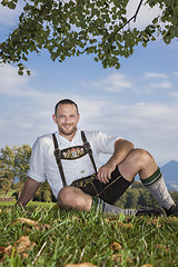 Image showing bavarian tradition man in the grass