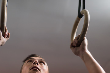 Image showing man doing dipping exercise