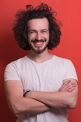 Image showing young man with funny hair over color background