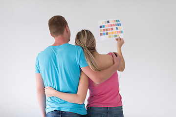 Image showing couple looking at color samples at home