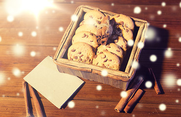 Image showing close up of oat cookies and card  on wooden table