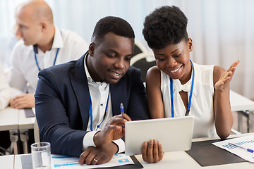 Image showing team with tablet pc at business conference