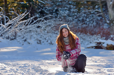 Image showing teen girl playing in snow