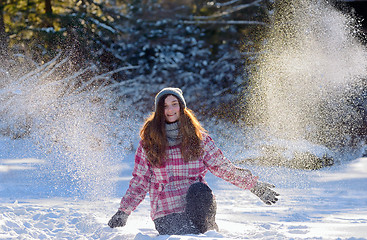 Image showing teen girl playing in snow 