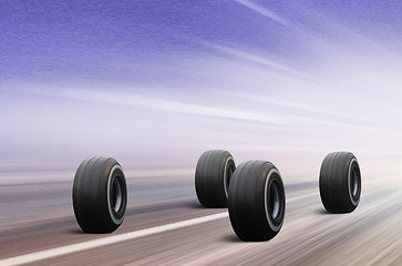 Image showing four tires on winter road