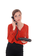 Image showing Business woman holding her old phone.