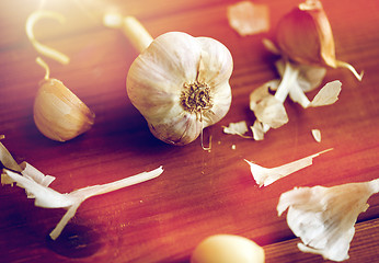 Image showing close up of garlic on wooden table