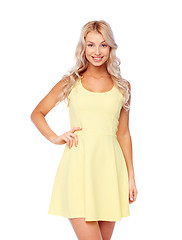 Image showing happy smiling beautiful young woman in dress