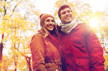 Image showing happy young couple walking in autumn park