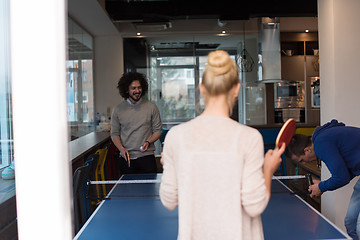 Image showing startup business team playing ping pong tennis