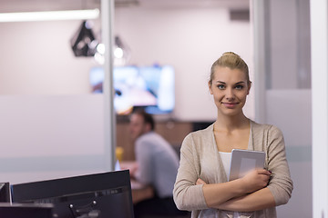 Image showing Business Woman Using Digital Tablet in front of startup Office