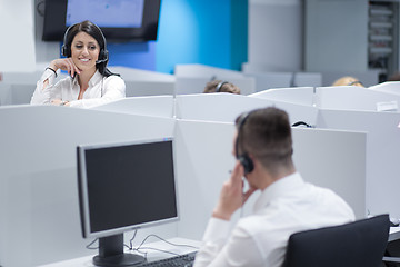 Image showing female call centre operator doing her job