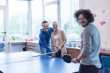 Image showing startup business team playing ping pong tennis