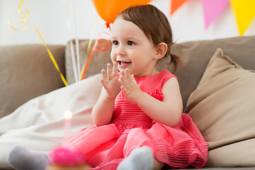 Image showing happy baby girl on birthday party at home