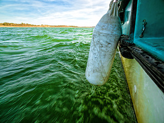 Image showing View of Green Ocean Waves from Boat Board