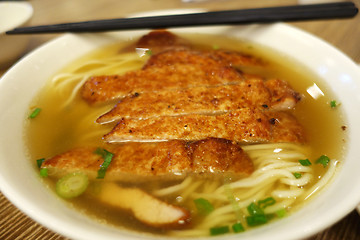 Image showing Pork chops with noodle soup