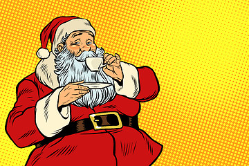 Image showing Santa Claus drinking tea or coffee