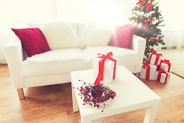 Image showing close up of christmas gift box on table at home