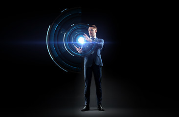 Image showing businessman in suit with virtual projection