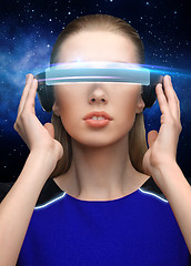 Image showing woman in virtual reality 3d glasses over black