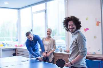 Image showing startup business team playing ping pong tennis