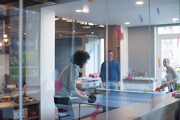 Image showing startup business team playing ping pong tennis