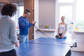 Image showing startup business team playing ping pong tennis