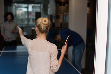 Image showing startup business team playing ping pong tennis