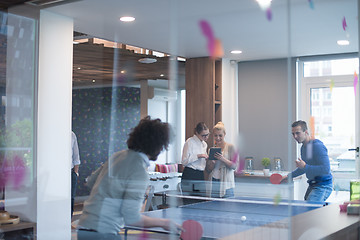 Image showing startup business team playing ping pong tennis