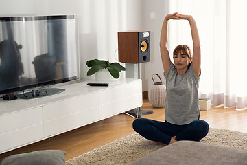 Image showing Doing exercise at home