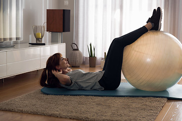 Image showing Doing exercise at home