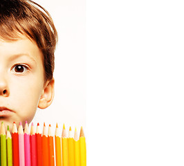 Image showing little cute boy with color pencils close up smiling