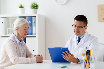 Image showing senior woman and doctor meeting at hospital