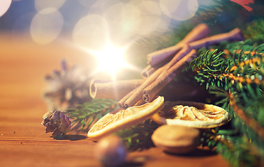 Image showing christmas fir branch, cinnamon and dried orange