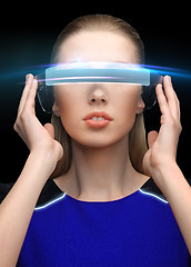 Image showing woman in virtual reality 3d glasses over black