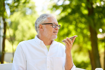 Image showing old man using voice command recorder on smartphone