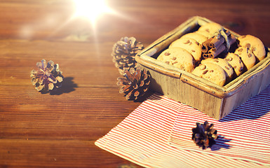 Image showing close up of christmas oat cookies on wooden table