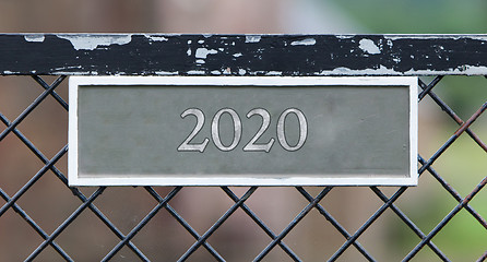 Image showing Sign on fence - 2020