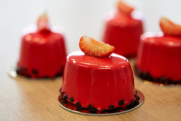 Image showing strawberry mirror glaze cakes at confectionery