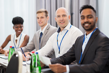 Image showing happy business team at international conference