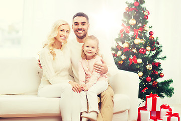 Image showing happy family at home with christmas tree