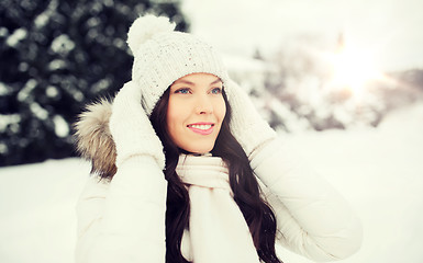 Image showing happy woman outdoors in winter clothes