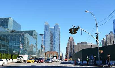 Image showing Traffic waits at intersection of 34th Street and 11th Avenue