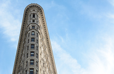 Image showing Narrow end of the Flatiron Building against a blue sky