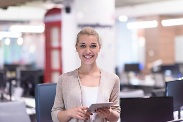 Image showing Business Woman Using Digital Tablet in front of startup Office