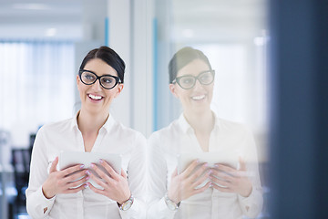 Image showing Business Woman Using Digital Tablet in front of startup Office