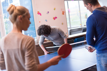 Image showing startup business team playing ping pong tennis